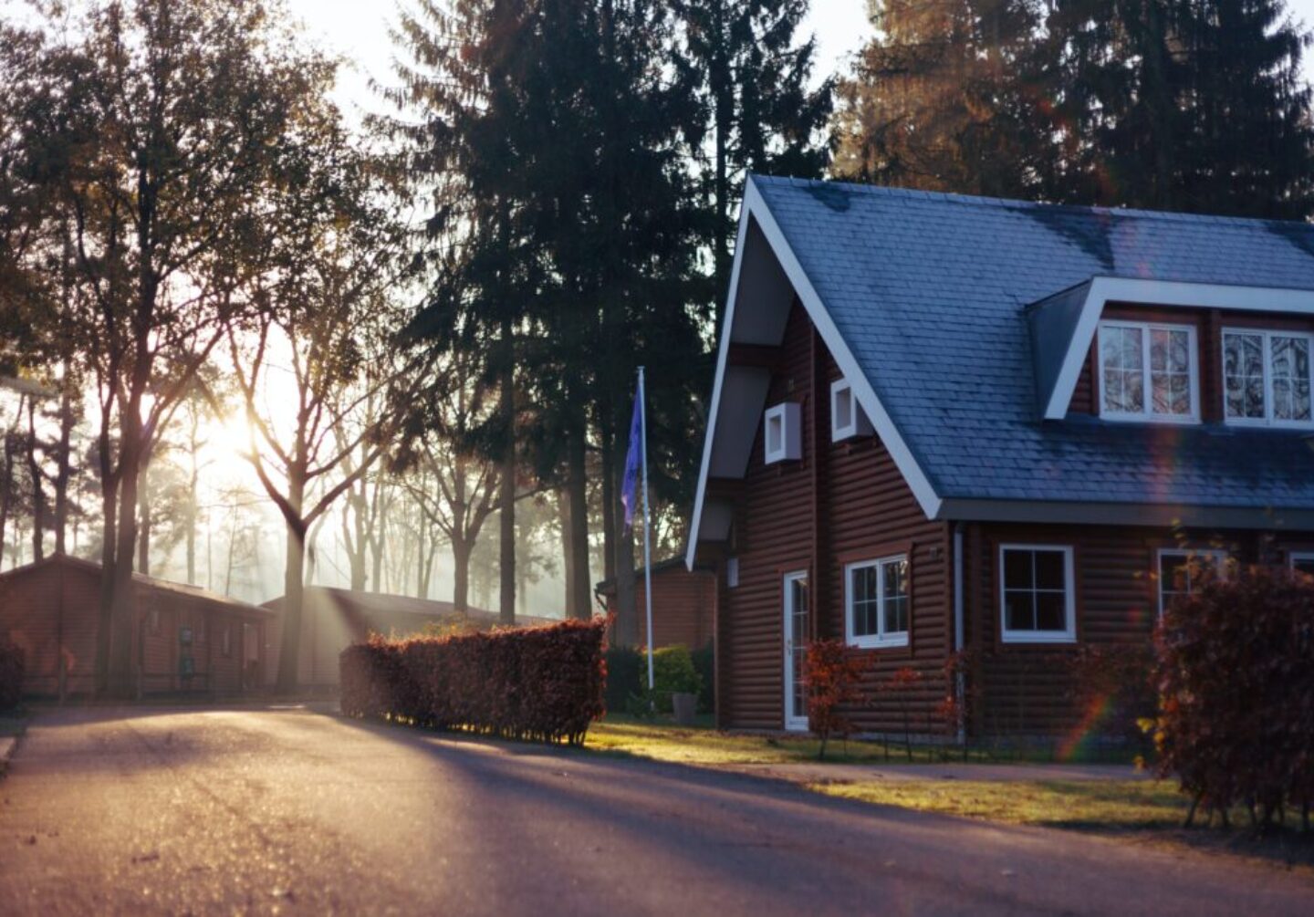brown and red house near trees